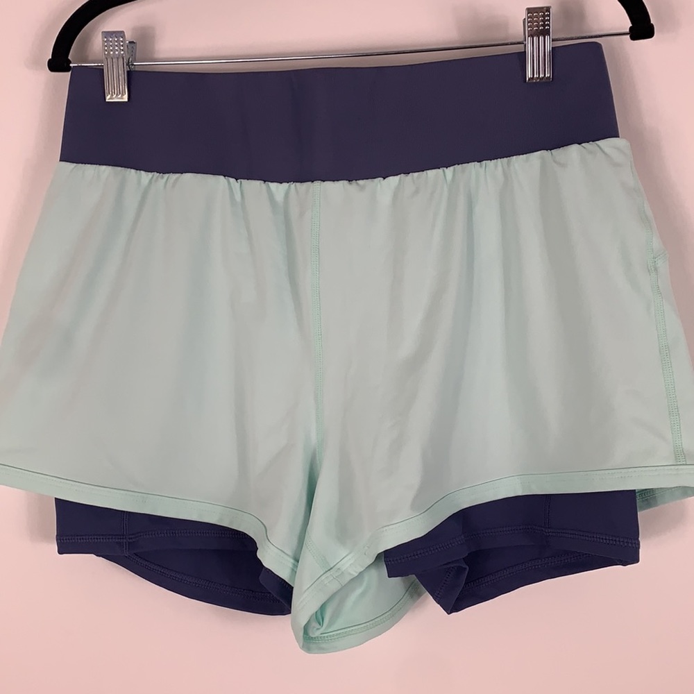 NWOT Fabletics teal blue/dusty blue shorts Lg